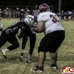 Simon Sanchez Sharks Jonathan Sablan plows through the Okkodo Bulldogs defense. (photo by Bout It Productions)