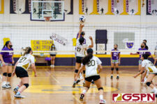GW Gecko Bonita Castro goes in for a hit against Tiyan Titan Andreyana Sejalbo. (Photo by Michael Blas)