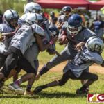 The Guam Raiders defense show force against the Island Broncos offense. (photo by Bout It Productions)