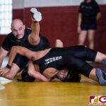 High School wrestlers hit the mats in a Preseason Tournament held at the FD Jungle. (photo by Bout It Productions.)