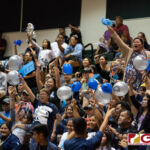 St. Paul Warrior fans cheer on their team as they continue to add points up on the board. (Photo by Michael Blas)