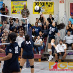 AOLG Cougar's Kristen Serrano launches ball over to the GW Geckos in the third set of the game. (Photo by Michael Blas)