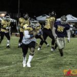 Guam High Panthers Travon Jacobs carries the ball towards the sidelines. (photo by Bout It Productions)