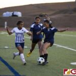 The Academy Cougars visited the turf of the Guam High Panthers with the sun setting down in the IIAAG Girls soccer matchup on Apr. 29, 2019 (photo by Bout It Productions)