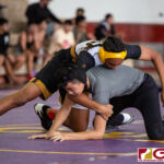 High School wrestlers hit the mats in a Preseason Tournament held at the FD Jungle. (photo by Bout It Productions.)