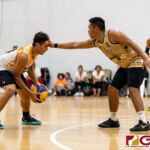 Jon Michael Lorena defends against Dillen Dela Cruz in the Guam Youth Leadership Cup 3x3 Basketball Tournament finals. (Photo by Michael Blas)