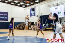 St. Paul Warrior Kirsten Silva fires from deep in the second quarter of the game. (Photo by Michael Blas)