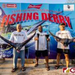 Blubyu pose with the fins of their catch for the 24th Annual Guam Marianas International Fishing Derby. (Photo by Michael Blas)