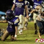 George Washington Geckos Jerome Quichocho loses control of the ball, but recovers it during mid fall. (Photo by Michael Blas)