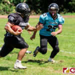 Sanchez Shark Kamerin Toves hits the sidelines for a huge gain as Southerns Dean Caldwell looks for the tackle. (Photo by Michael Blas)