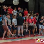 St. John's Knights supporters cheer on their home team as they take the second set of the game. (Photo by Michael Blas)