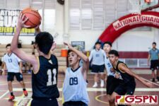 Tiyan Titan Juan Duenas looks for the open man while ND Royal Tyler Concepcion pressures. (Photo by Michael Blas)