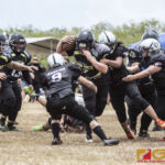 The Sindalu Raiders and SB Saints hit the gridiron in the opening week of the 2019 GWFTL Season. (photo by Bout It Productions)