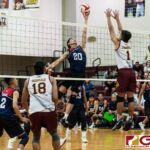 Okkodo Bulldogs Jarwin Espiritu on the tip while Friars Logan Pangelinan goes up to contests. (Photo by Michael Blas)