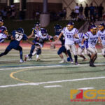 GW Geckos' Dominador Jamanila III attempts to slip past the hands of the Guam High Panther's defense. (Photo by Michael Blas)