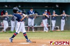 Guam's Ricardo Leon Guerrero hits a grounder in the second inning of the game. (Photo by Michael Blas)