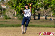 Academy Cougar Talen Topasna makes the catch in the outfield to end the inning. (Photo by Michael Blas)