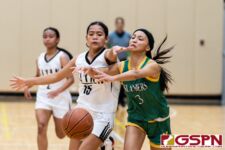 Tiyan Titan Andreyanna Sejalbo pops the ball out of the hands of Islander Isabella Roberto. (Photo by Michael Blas)