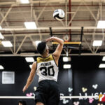 Tiyan Titan Dominic Pelobello serves up an overhead spike to the Okkodo Bulldogs. Photo by Bout It Productions.