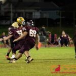 Father Duenas Friars Rylan Napoleon gets a sack on Tiyan Titans John Angoco. (Photo by Michael Blas)