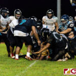 JFK Islanders Jacobe Quinata gets into the end zone for the first and only touchdown of the game. (Photo by Michael Blas)