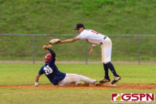 ND Royal Brandon Tuguera slides back to second base before Okkodo Bulldog Tyler Santos can make a play. (Photo by Michael Blas)