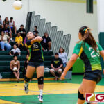JFK Islander Maiya Taijeron connects with the ball off a serve from the Knights. (Photo by Michael Blas)