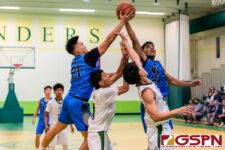 The Warriors and Islanders reach up for the rebound in the first half of the game. (Photo by Michael Blas)