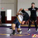 High School wrestlers hit the mats in a Preseason Tournament held at the FD Jungle. (photo by Bout It Productions.)
