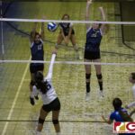 Guam High Panthers Sofia Cunningham & Ashley
Dill go up against Notre Dame Royals Minami Rabago. (photo by Bout It Productions)
