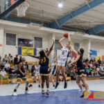 Academy Cougars Mia San Nicolas knocks in two points with a fade away jumper in the paint. (Photo by Michael Blas)