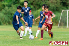 Harvest Eagle Gye Baek Kim and FD Friar Morgan McKenna run down the ball early in the first half. (Photo by Michael Blas)