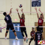 St. Paul Warriors Nichika Fermin gets high up for a spike through the Okkodo defenders. (Photo by Michael Blas)