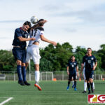 Philippines Carlos Martinez De Murga and Guam Matao Forward Joseph Ciochetto go up for a header. (Photo by Michael Blas)