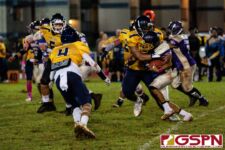 Guam High Panther Izaak Castro wraps up Gecko RB Aiden Gumataotao for no gain on the play. (Photo by Michael Blas)