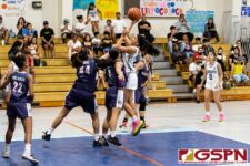 Academy Cougar Myka Terlaje goes in for two points against Okkodo Bulldogs Anyanette Ponce and Racquel Camacho. (Photo by Michael Blas)