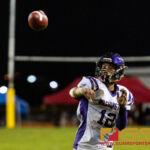 Player of the game Aaron Jamanila throws for the first touchdown of the 2018 IIAAG high school football game between the GW Geckos and the JFK Islanders. (Photo by Michael Blas)