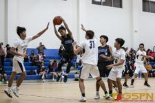 ND Royals JV Aidean Leon Guerrero goes airborne through the defense. ( Photo by Bout It Productions )