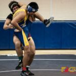 Father Duenas Friars Matias Calvo pins Guam High Panthers Julio Rosas in the 195 pound division of the 2018 IIAAG high school boys wrestling match. (Photo by Michael Blas)