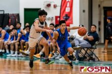 St. Paul Warrior Brandon Miranda brings the ball down court as FD Friar Brock Ada pressures. (Photo by Michael Blas)