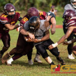 Father Duenas Friar's Rylan Napoleon makes the tackle on the Simon Sanchez Shark's RB. The Simon Sanchez Sharks faced off against the Father Duenas Friars in the 2018 IIAAG HS Football game Saturday late afternoon. (Photo by Michael Blas)
