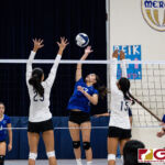ND Royal Gia Camacho gets up for a spike while Academy Kristen Serrano and Melanie Damian go up to block. (Photo by Michael Blas)