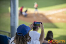 JFK Islander fan Zacqulene Ibanez captures video footage of her son Zavier Camacho at bat. ( Photo by Bout It Productions )