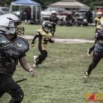 Barrigada Crusaders Liam Camacho gets by the Guahan Eagles defense for an easy six. (photo by Bout It Productions)