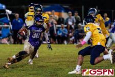 GW Gecko Dominador Jamanila III makes a cut inside to avoid Panther defender Terrell Rosario. (Photo by Michael Blas)