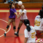 GW Gecko Lola Aguon and Abrienne Chargualaf go in for a bump on an St. John's serve. (Photo by Michael Blas)
