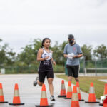 Simon Sanchez Sharks Chloe Flores gets ahead of the girls and takes first place in the ISA cross country meet. Photo by Bout It Productions