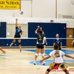 Harvest Christian Academy Eagles Gabrielle Paulin leaps up to spike down onto the Guam High Panthers. (Photo by Michael Blas)