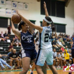 Academy Cougars Therese Fegurgur gets pressured by St. Paul Warriors Niah Siguenza. (Photo by Michael Blas)