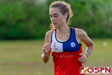 A St. John's runner continues up hill during the IIAAG Cross Country All-Island meet. (Photo by Michael Blas)